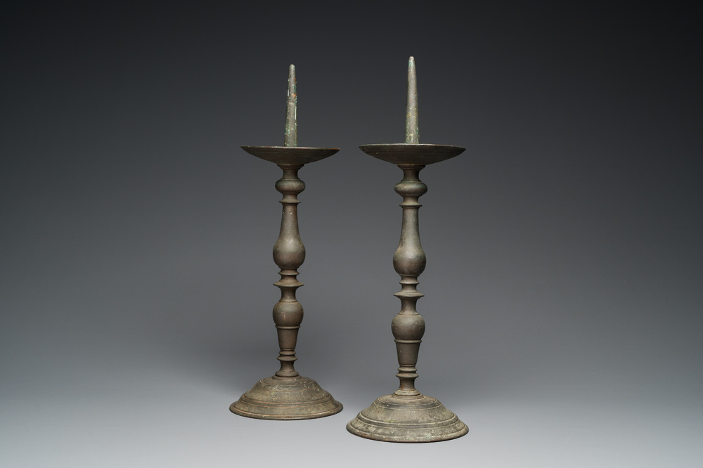 A pair of patinated bronze pricket candlesticks, France, 17th C.
