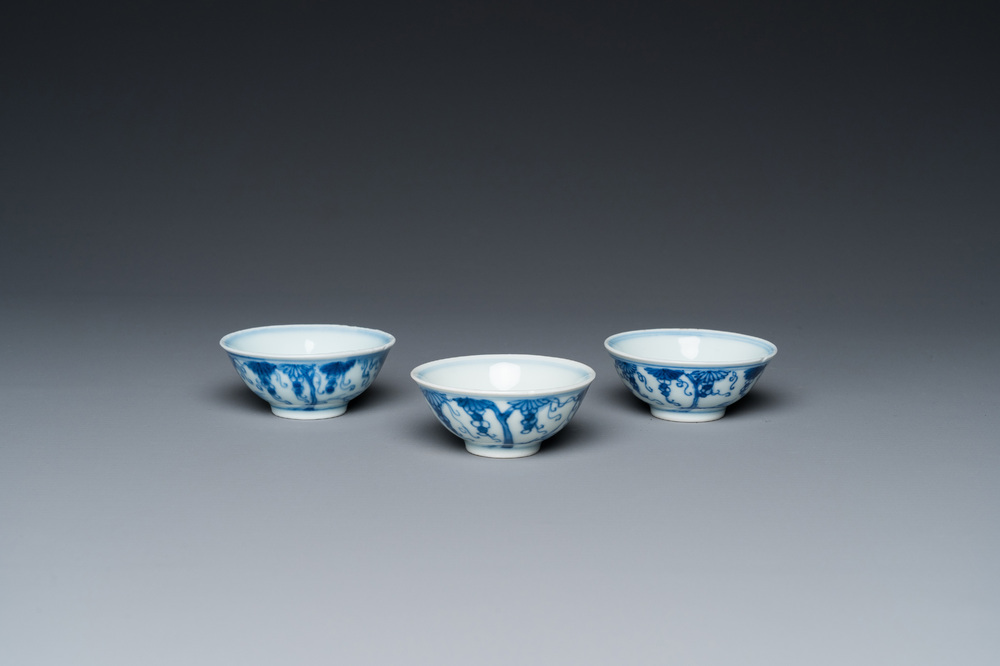 Three Chinese blue and white 'grapevine' bowls, Yongzheng mark and of the period