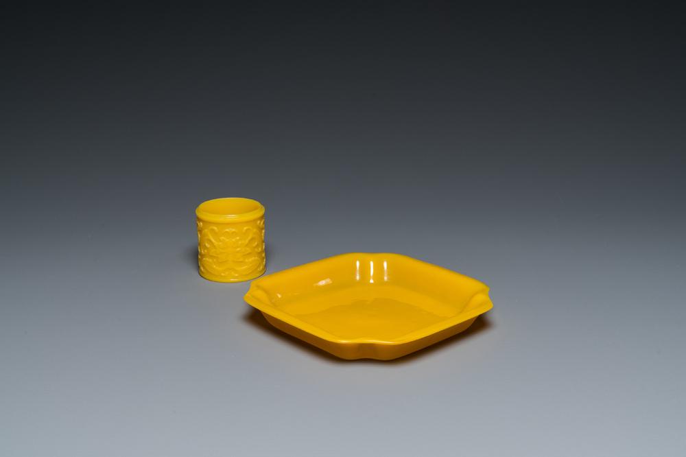 A Chinese yellow Peking glass chamfered dish and a cylindrical container, Qing/Republic