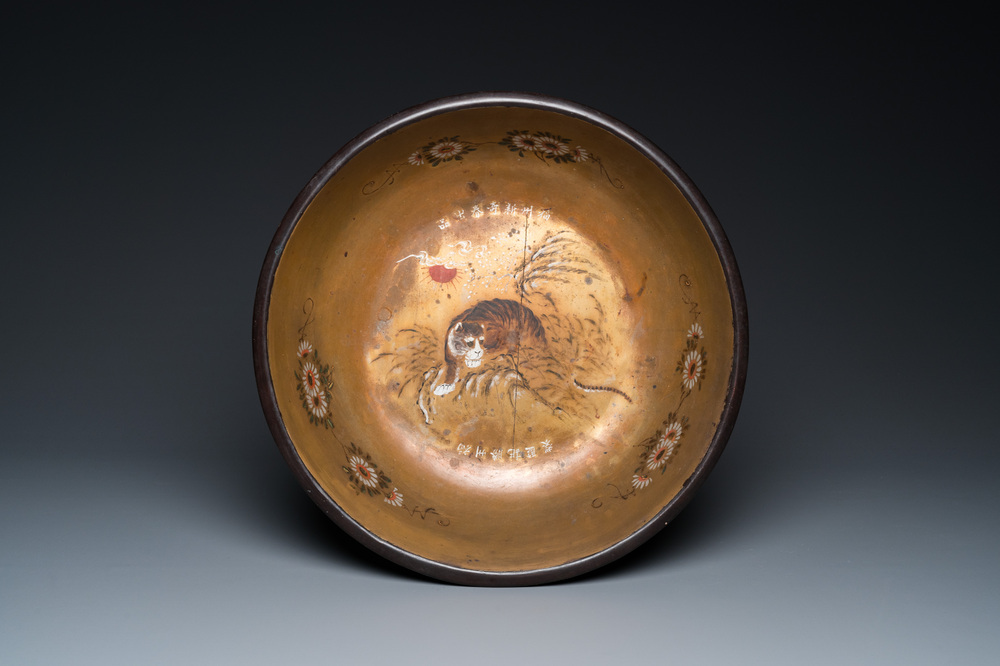 A large Chinese Fuzhou or Foochow lacquer 'tiger' bowl, inscribed 'xin qi chun', 19/20th C.
