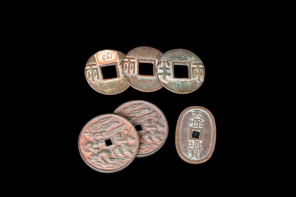 Five Chinese bronze coins and a Japanese coin, possibly Qin and later