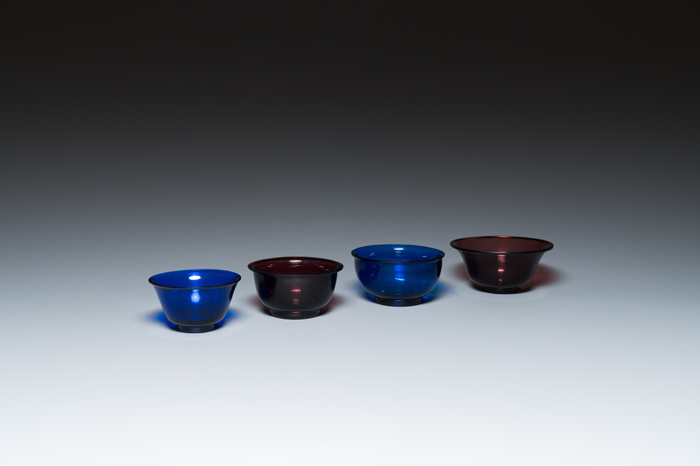 Four Chinese aubergine and blue Beijing glass bowls, Qing