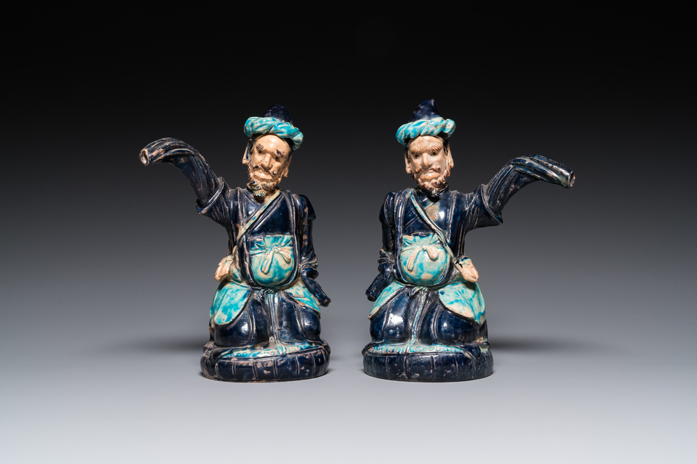 A pair of Chinese fahua ewers and covers in the shape of Sogdian merchants, 17th C.