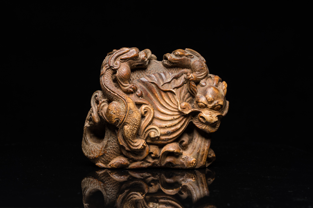 A Chinese soapstone 'dragons' group, 19th C.