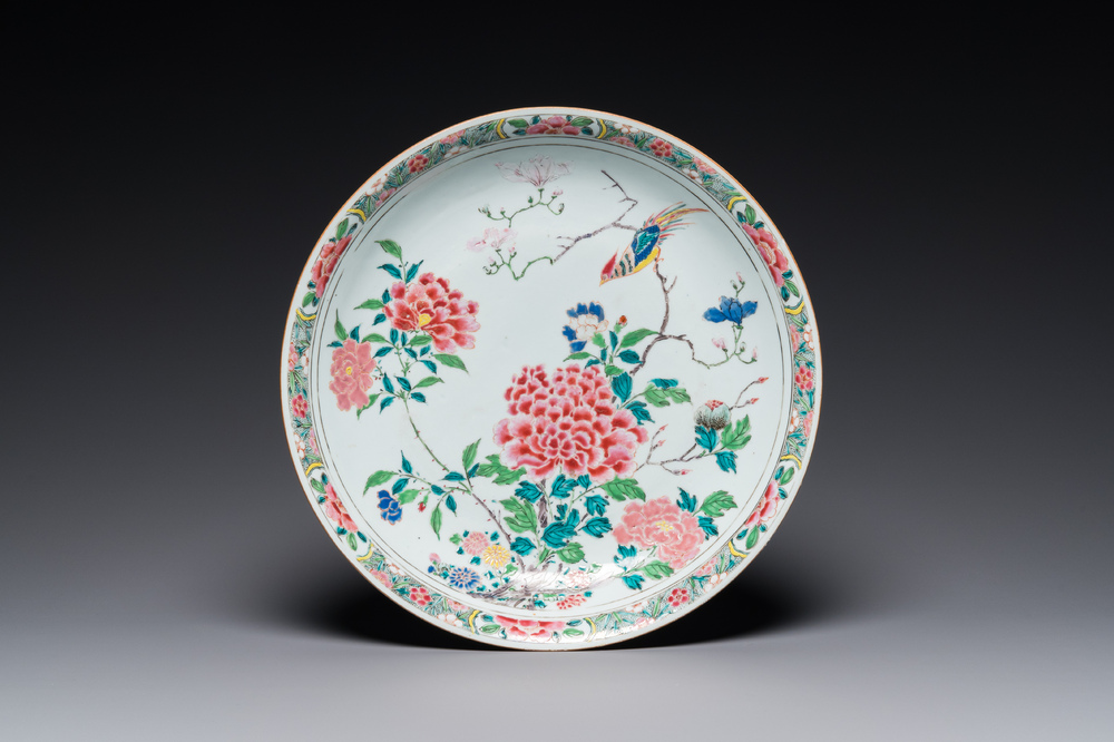 A Chinese famille rose dish with birds among fine blossoming branches, Yongzheng