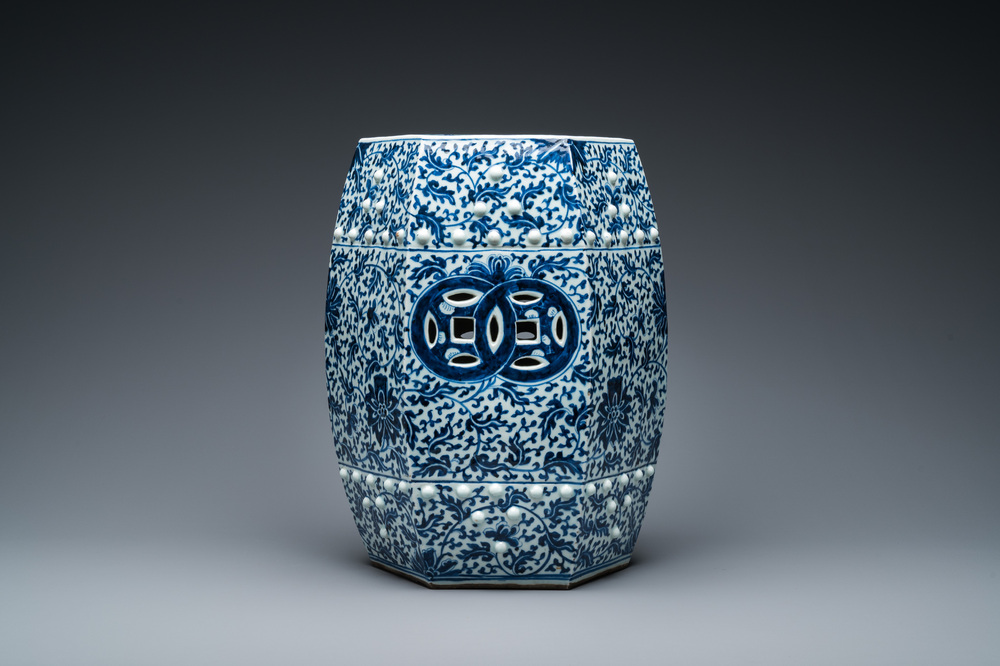 A Chinese blue and white hexagonal garden seat with floral design, 19th C.