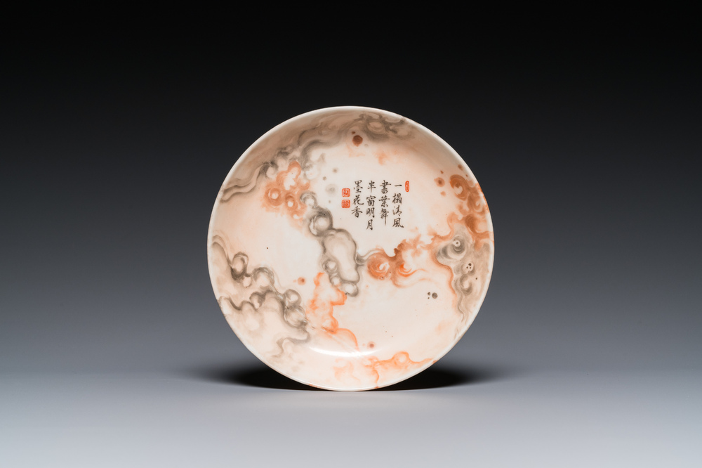 A Chinese faux-marble painted porcelain plate with a poem and Tang Ying mark, Qianlong mark, 19th C.