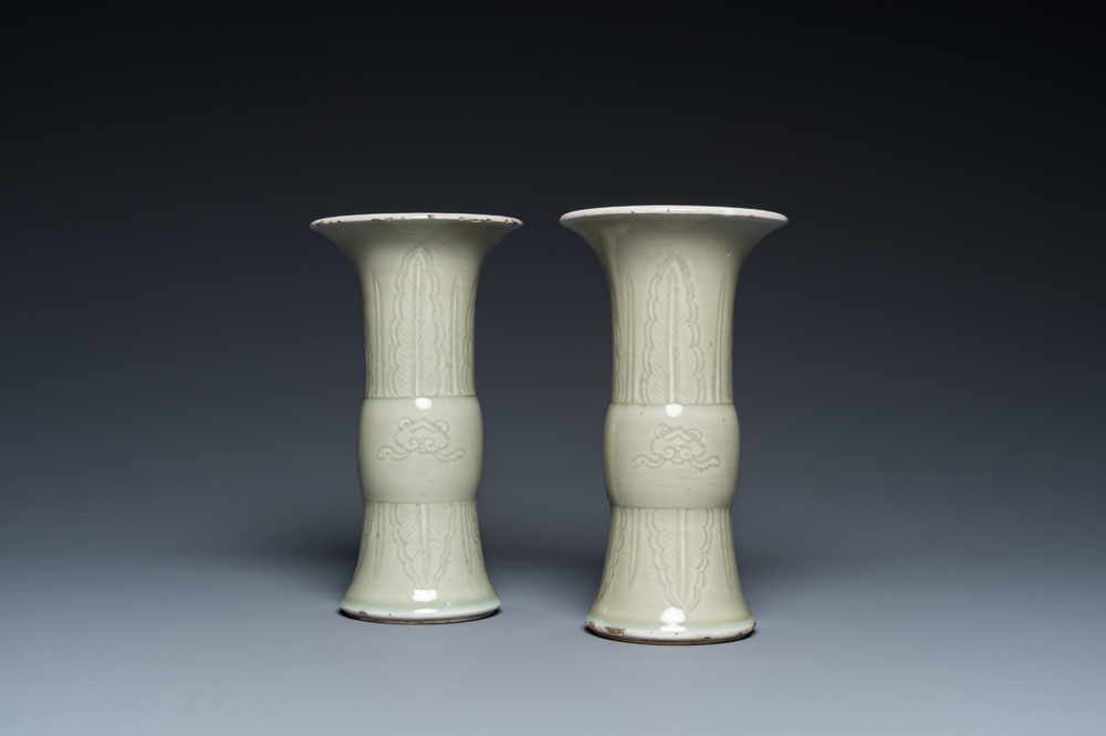 A pair of Chinese celadon-glazed 'gu' vases, 18th C.