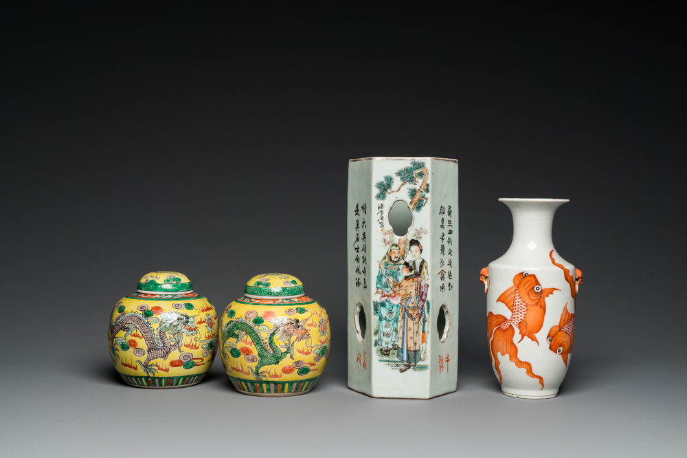 A pair of Chinese 'dragon' jars and covers, a 'goldfish' vase and a qianjiang cai hat stand, 19/20th C.