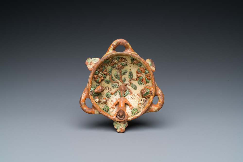 A slip-decorated three-handled earthenware bowl, probably Germany, 16/17th C.