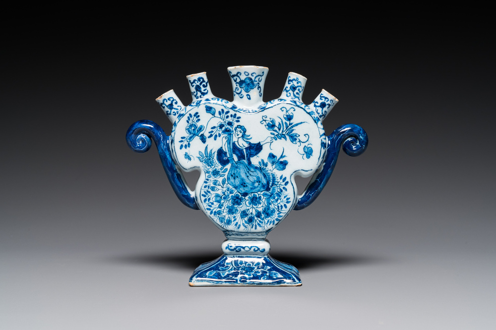 A blue and white Dutch Delft heart-shaped tulip vase with a lady with cornucopia, 18th C.