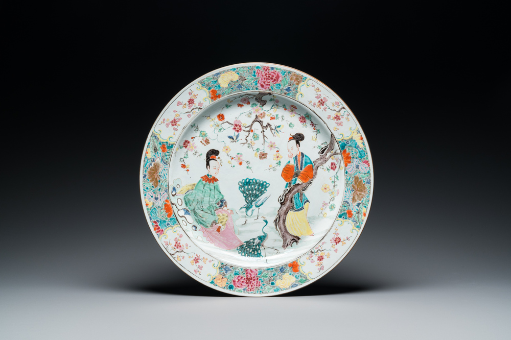 A large Chinese famille rose 'ladies and peacocks' dish, Yongzheng