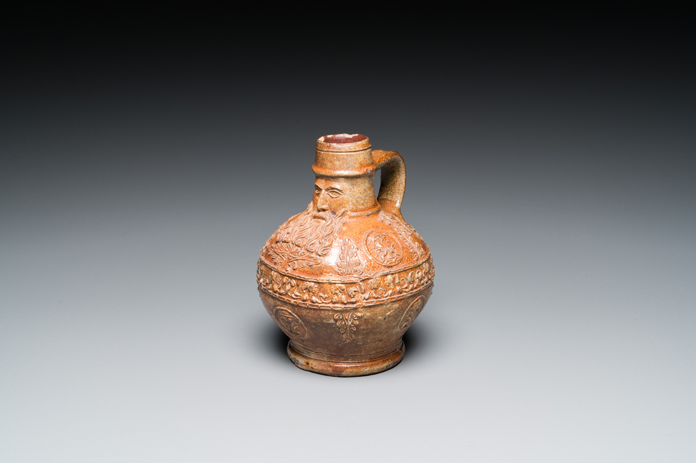 A small stoneware bellarmine jug with portrait medallions, Cologne, 16th C.