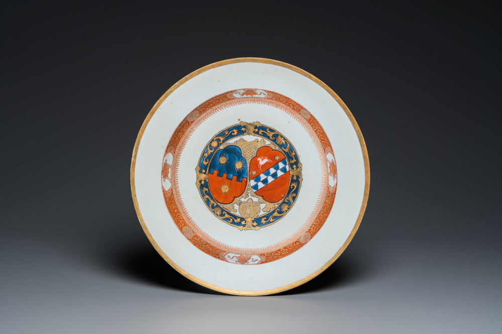 A Chinese famille rose armorial dish in iron-red, gilt and blue and white, Qianlong
