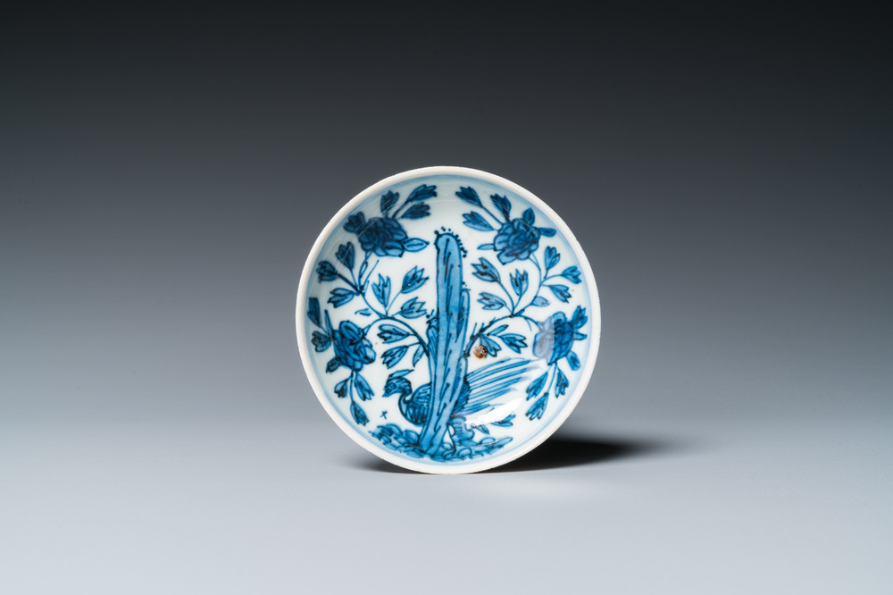 A Chinese blue and white saucer with a pheasant behind a rock, 'rabbit' mark, Wanli