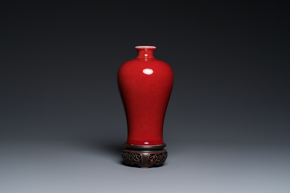 A Chinese monochrome copper-red-glazed 'meiping' vase on wooden stand, Republic
