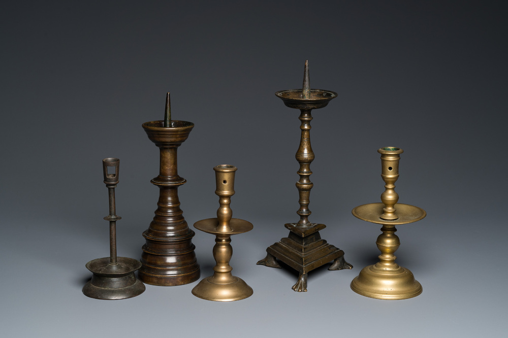 Five brass and bronze candlesticks, 16th C. and later