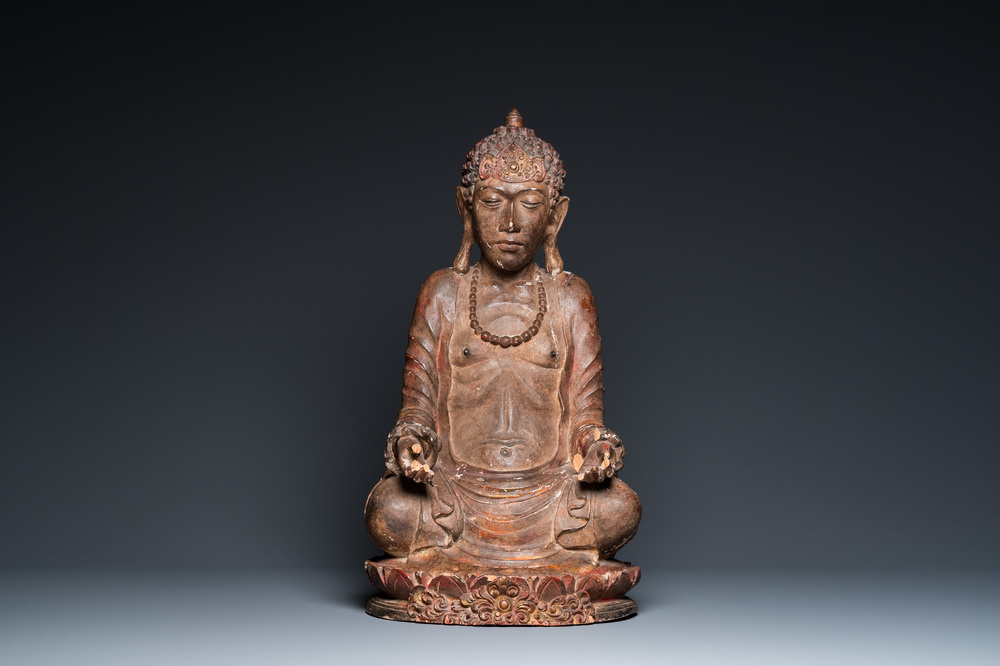 A gilded and lacquered wood sculpture of a praying ascetic, probably Thailand, 18th C.