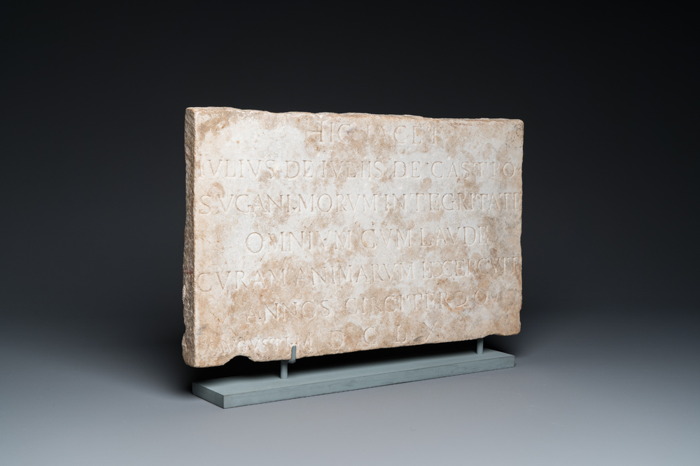 A marble tomb stone in Roman style, dated 1660