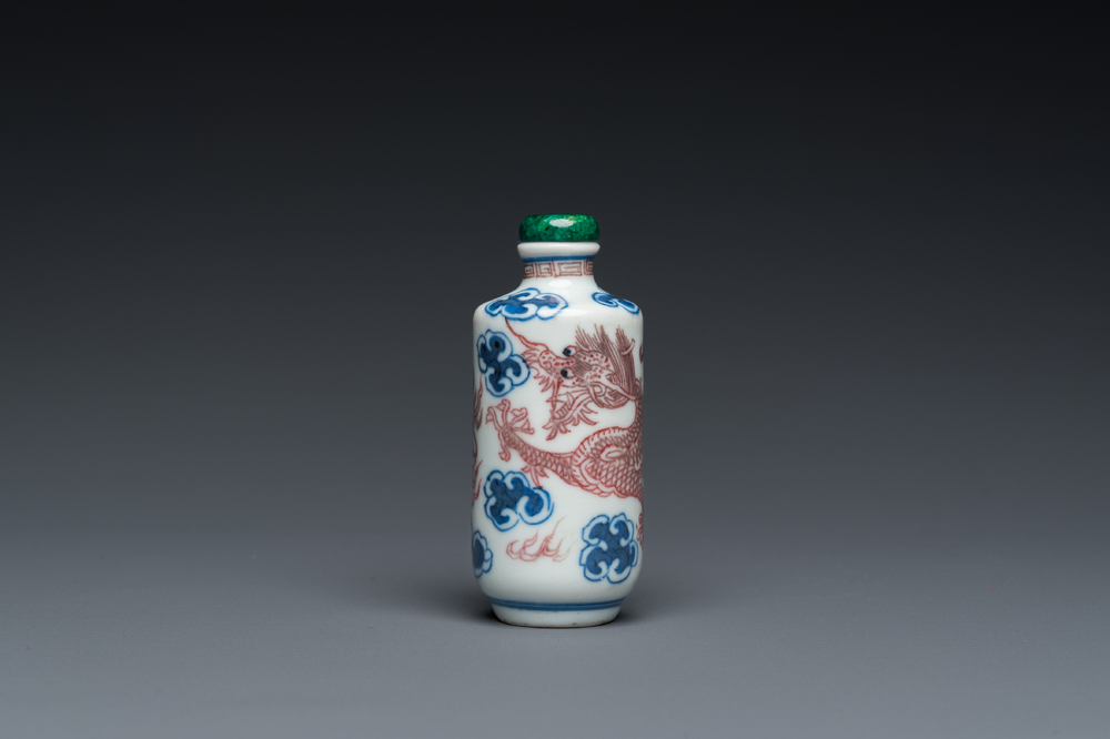 A Chinese blue, white and copper-red 'dragon' snuff bottle, Yongzheng mark, 19th C.