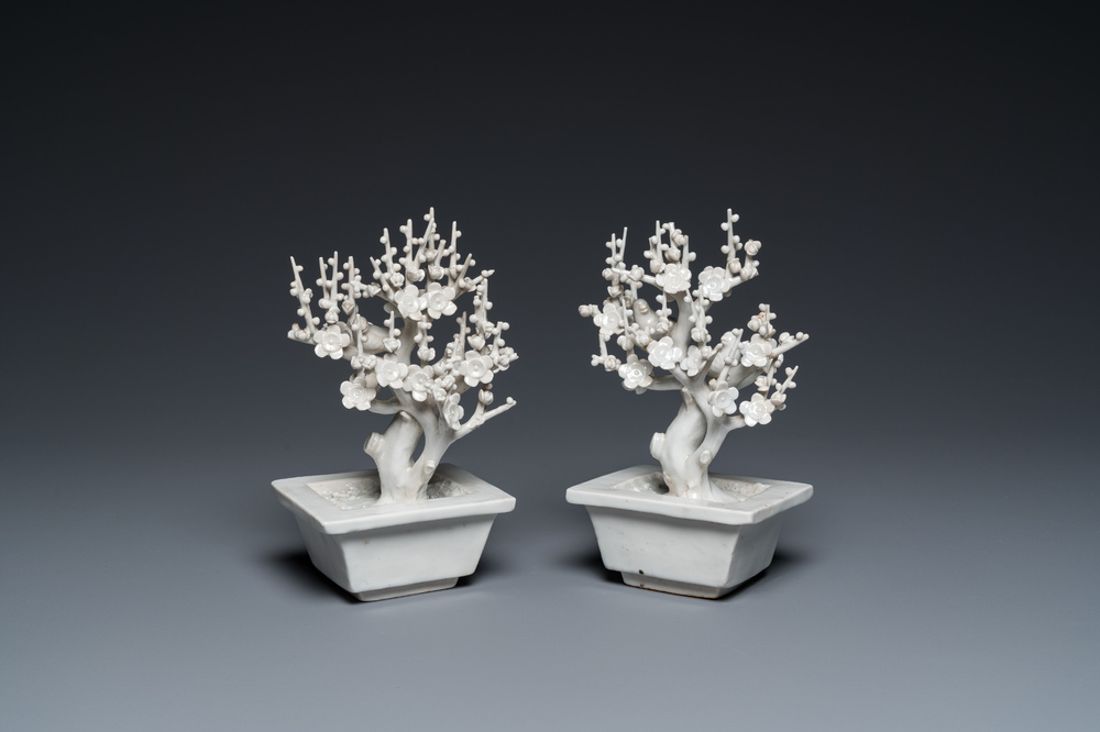 A pair of Chinese Dehua blanc de Chine trees with birds, Kangxi
