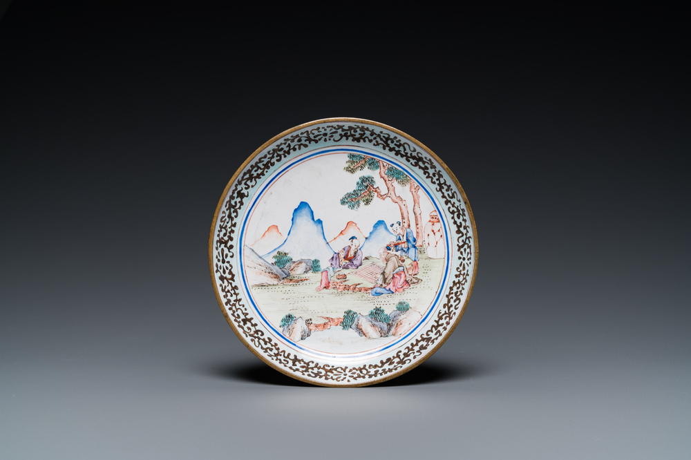 A Chinese Canton enamel 'go-players' plate, Yongzheng/Qianlong