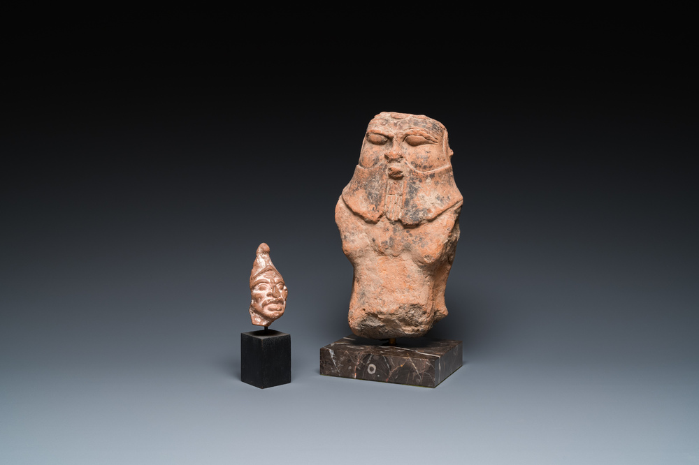 Une sculpture romaine du dieu B&egrave;s en terre cuite et une t&ecirc;te d'homme grotesque, ca. 1er si&egrave;cle