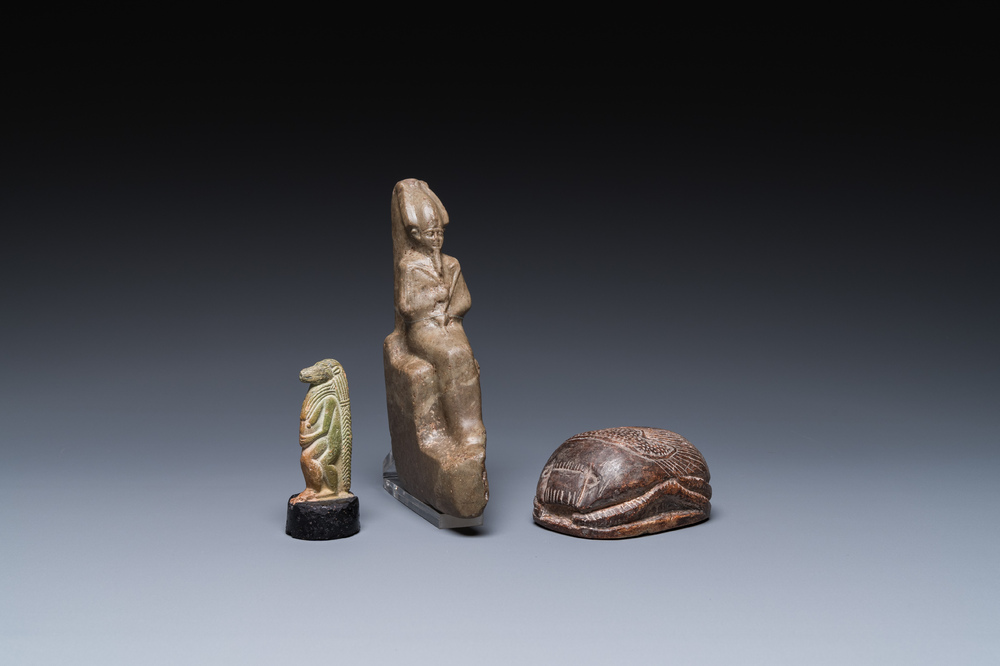 A green stone sculpture of Osiris, a steatite scarab and a green frit Thot, Egypt, New Kingdom to Ptolemaic period