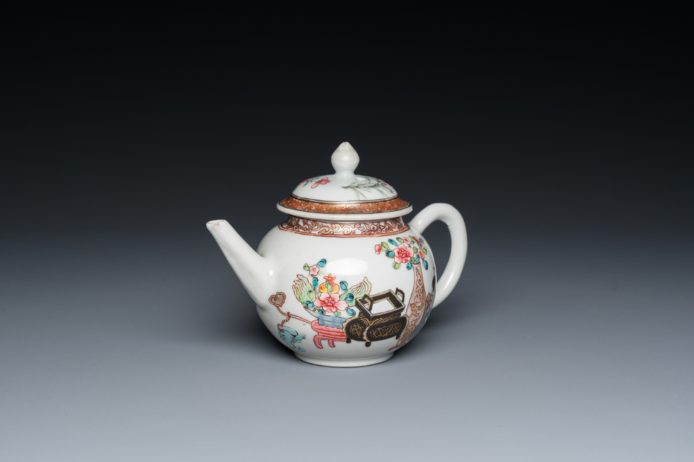 A Chinese famille rose 'antiquities' teapot and cover, Yongzheng
