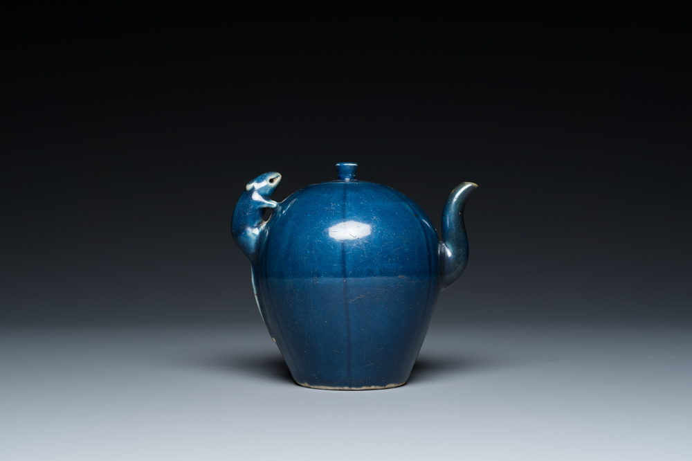 A Chinese blue-glazed teapot with a rat-shaped handle, Transitional period