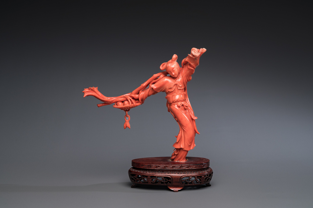 A Chinese red coral sculpture of the immortal Lan Caihe, 19/20th C.