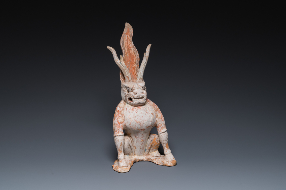 A Chinese painted pottery earth spirit, Tang