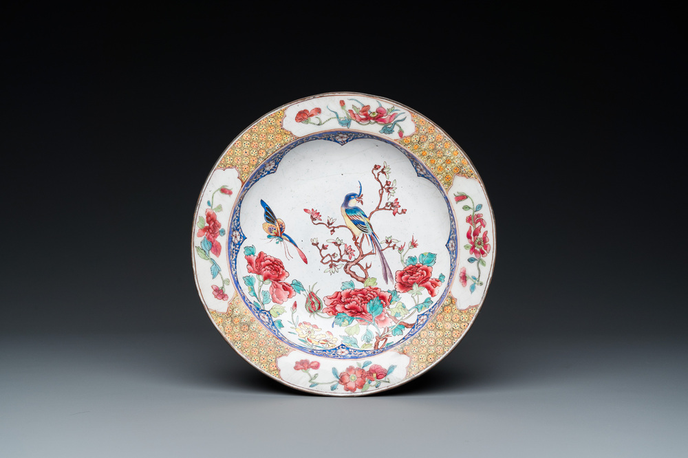 A Chinese 'ruby back' Canton enamel plate with a butterfly and a pheasant, Yongzheng