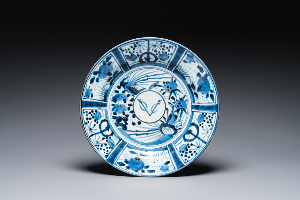 A Japanese Arita blue and white dish with VOC monogram, Edo, 17th C.