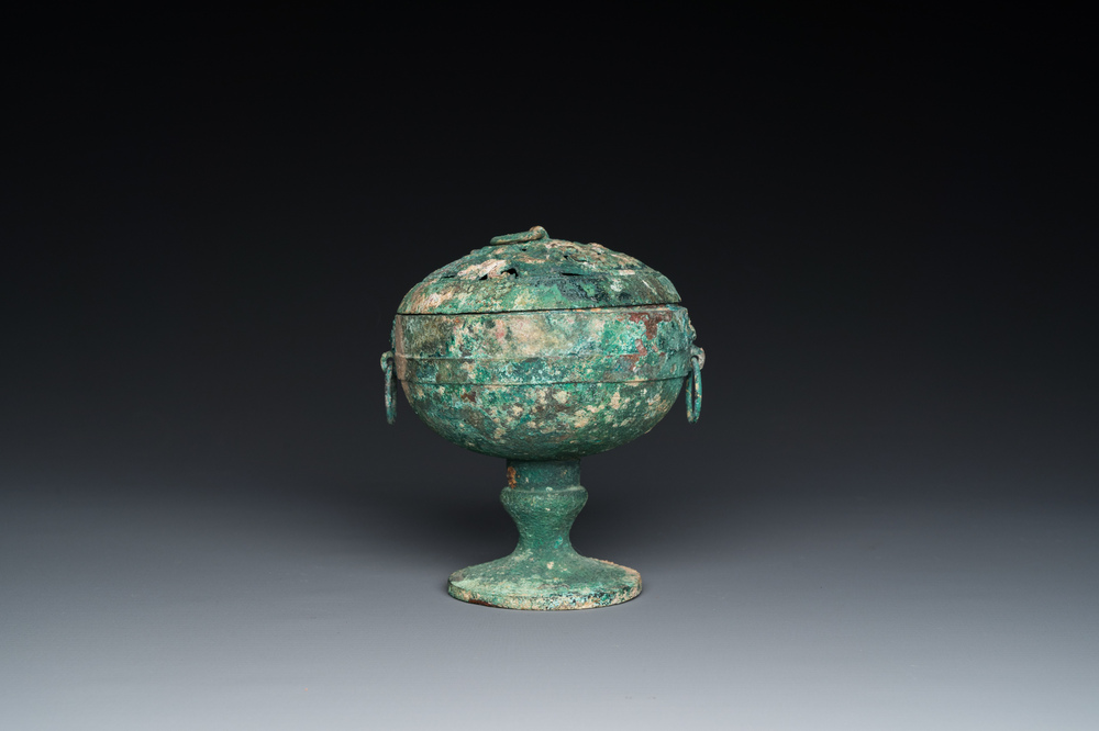 A Chinese bronze 'xianglu' censer with reticulated cover, Western Han