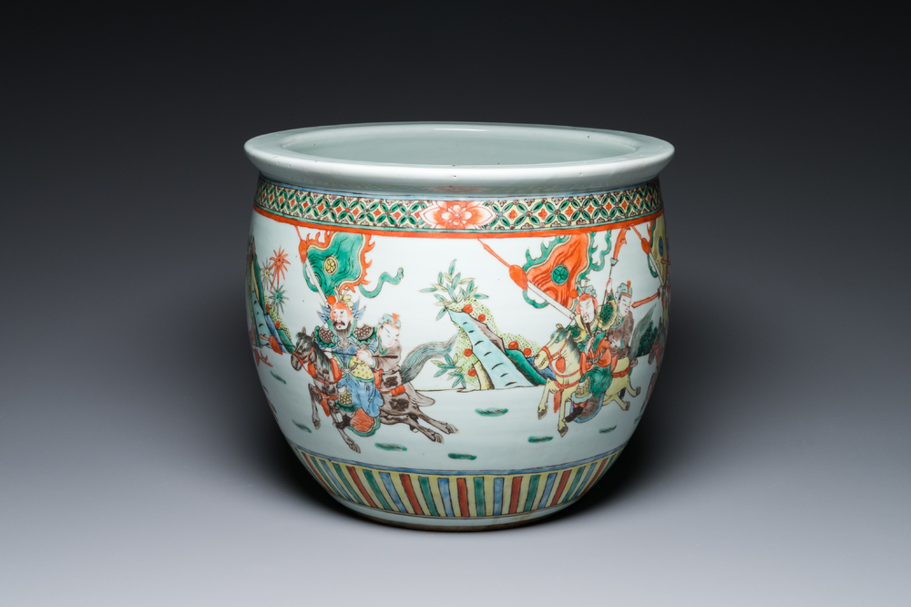 A Chinese famille verte fish bowl with warriors on horseback, 19th C.