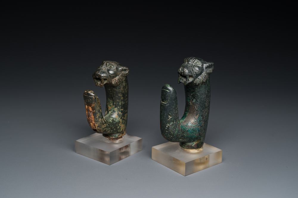 A pair of Roman bronze panther head fittings with finger-shaped hooks, ca. 2nd C.