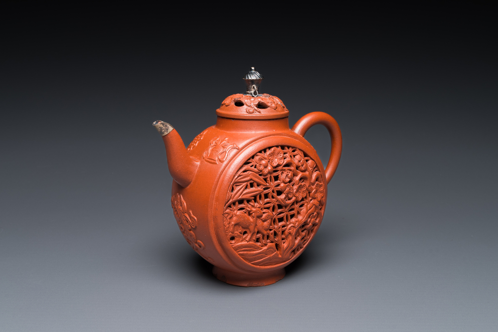 A Chinese reticulated double-walled Yixing stoneware teapot and cover with silver mounts, Kangxi