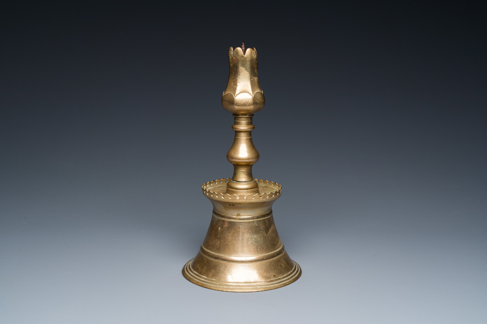 An Ottoman bronze candlestick with tulip-shaped sconce, Turkey, 17th C.