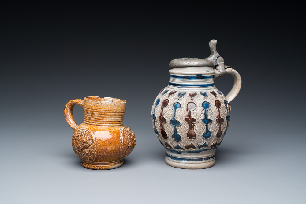 A stoneware armorial jug and a pewter-mounted jug, Raeren and Westerwald, 16/17th C.