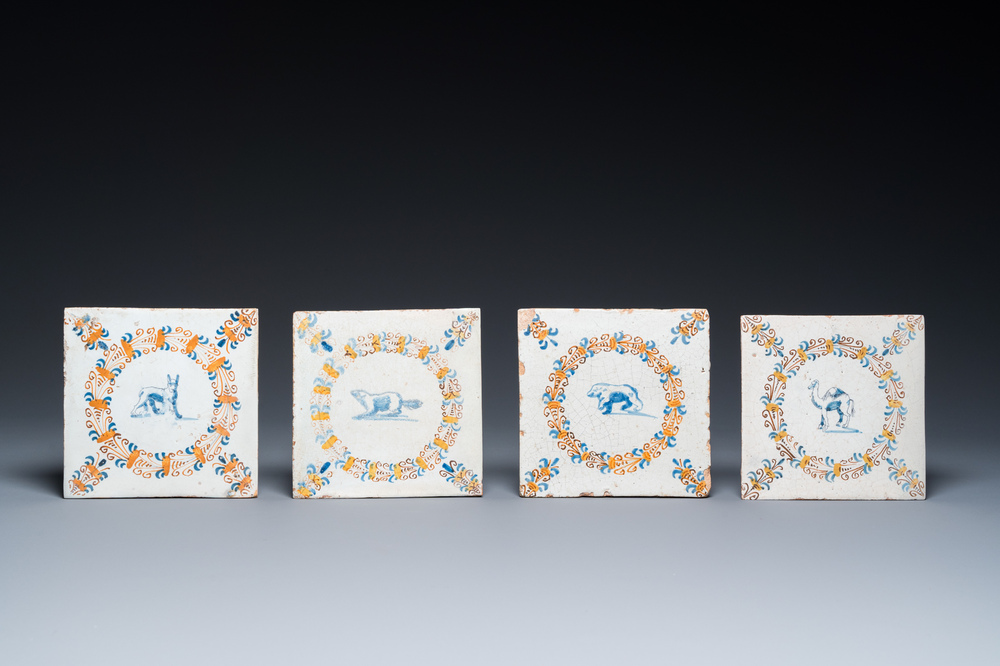 Four polychrome Dutch Delft tiles with animals in aigrette medallions, Haarlem, 17th C.