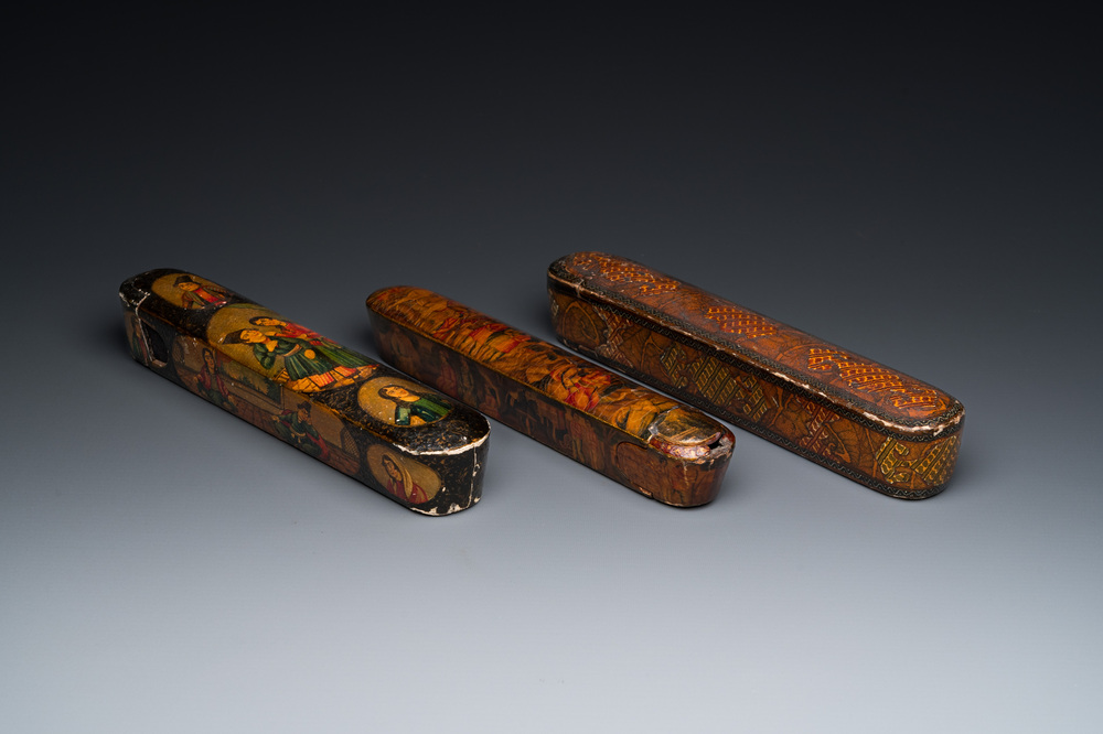 Three lacquered papier-mach&eacute; pen boxes or qalamdans, Qajar, Persia, 19th C.