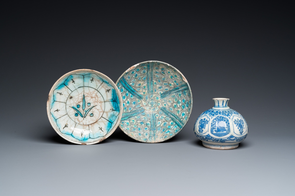 A blue and white Safavid hookah base, a Kashan bowl and a Kutahya plate, Persia and Turkey, 14th C. and later
