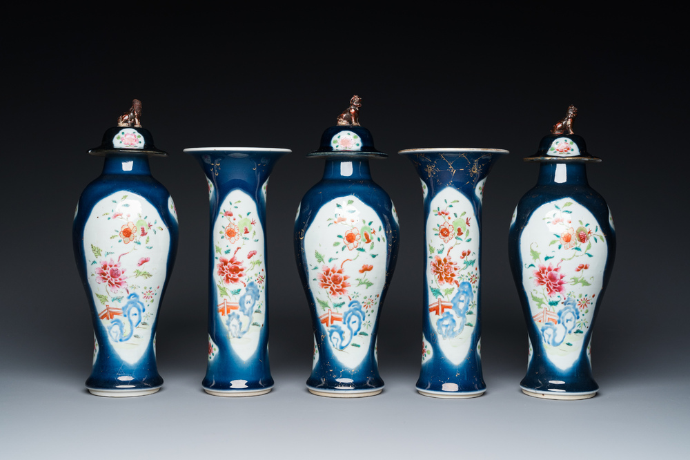A Chinese blue-ground famille rose garniture of five vases with floral design, Qianlong