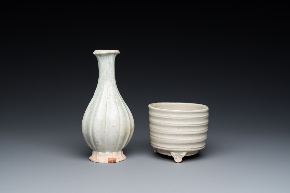 A Chinese qingbai wall pocket vase and a three-legged incense burner, Song