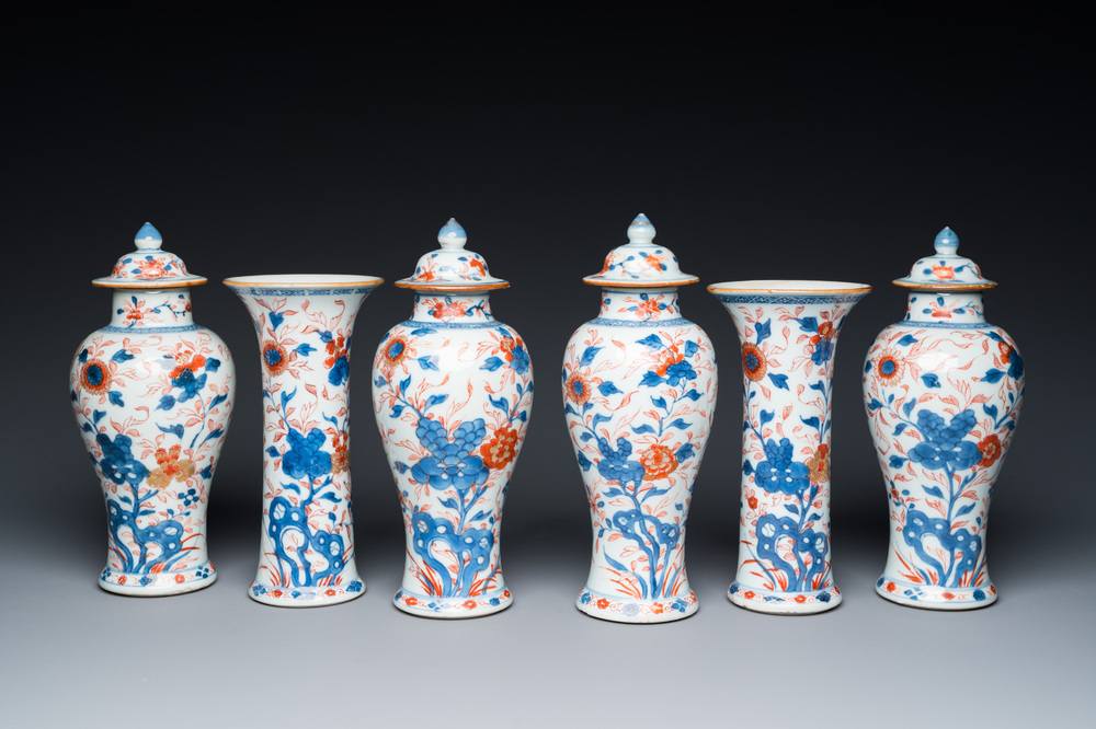 A Chinese Imari-style garniture of six vases with floral design, Kangxi