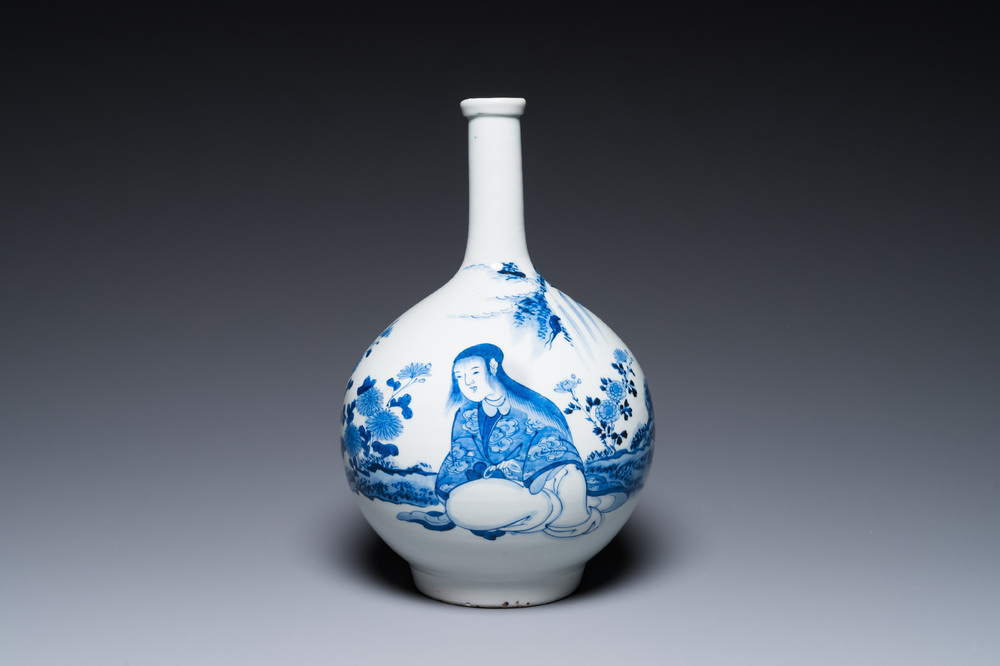 A Japanese blue and white bottle vase with a lady in a landscape, Edo, 17/18th C.