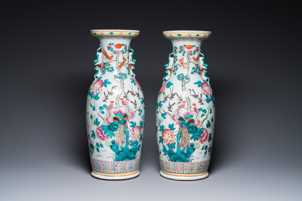 A pair of Chinese famille rose vases with peacocks and phoenixes, 19th C.
