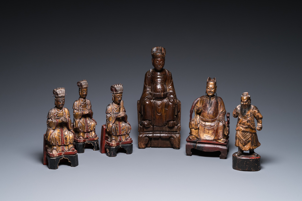 Six Chinese partly gilded wooden sculptures of dignitaries and guards, Ming and later
