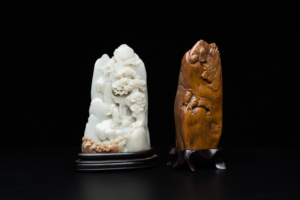 A Chinese brown jade inscribed seal stamp and a white jade 'mountainous landscape' carving, 19/20th C.